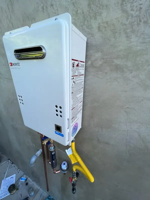 Tankless water heater installation for Harmony Hall homes
